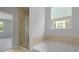 Bathroom featuring a walk-in shower and a soaking tub at 222 Seele St, Summerville, SC 29485