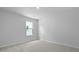Bright carpeted bedroom with a window allowing ample natural light at 222 Seele St, Summerville, SC 29485
