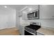 Well-designed kitchen with stainless steel appliances, granite countertops, and ample storage at 222 Seele St, Summerville, SC 29485