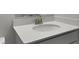 Close-up of a bathroom vanity with a white countertop, sink, and bronze faucet at 226 Seele St, Summerville, SC 29485