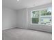 Bedroom with neutral carpet and large window at 226 Seele St, Summerville, SC 29485