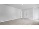 Cozy carpeted bedroom showcasing neutral colors and double door closet at 226 Seele St, Summerville, SC 29485