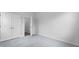 Bedroom featuring gray carpeting, a closet and a doorway, providing ample space and functionality at 226 Seele St, Summerville, SC 29485