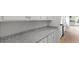 Close up of a kitchen countertop with white cabinets below, showcasing a modern and clean design at 226 Seele St, Summerville, SC 29485