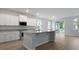 Bright kitchen featuring a center island, granite countertops and stainless steel appliances at 226 Seele St, Summerville, SC 29485