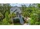 Aerial view of charming home surrounded by lush trees and landscaping at 2301 N Creek Dr, Mount Pleasant, SC 29466