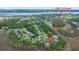 An aerial view of the 2301 N Creek residence in a leafy residential area with water views at 2301 N Creek Dr, Mount Pleasant, SC 29466