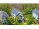 Birds-eye view of a home nestled among lush greenery in a neighborhood at 2301 N Creek Dr, Mount Pleasant, SC 29466
