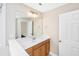 Bathroom with vanity, a door to the side and neutral colors at 2301 N Creek Dr, Mount Pleasant, SC 29466