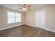 Bedroom featuring a ceiling fan, modern floors, and a window with blinds at 2301 N Creek Dr, Mount Pleasant, SC 29466