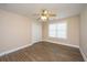 Neutral bedroom with wood-look floors, window, and closet offers a blank canvas at 2301 N Creek Dr, Mount Pleasant, SC 29466