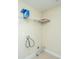 Compact laundry area includes hookups, shelving, and clean white trim at 2301 N Creek Dr, Mount Pleasant, SC 29466