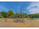 Outdoor playground with climbing structure for children, set in a community park area at 2301 N Creek Dr, Mount Pleasant, SC 29466