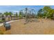 Community playground featuring climbing structure, surrounded by wood chip ground cover at 2301 N Creek Dr, Mount Pleasant, SC 29466