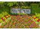Welcome to Rivertowne: An established community with lush landscaping and colorful flowerbeds at the entrance at 2301 N Creek Dr, Mount Pleasant, SC 29466
