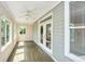This sunroom offers a peaceful spot with multiple windows and doors at 2301 N Creek Dr, Mount Pleasant, SC 29466