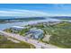 Stunning aerial shot of waterfront condos near a marsh, showcasing a scenic coastal community at 2393 Folly Rd # 1G, Folly Beach, SC 29439