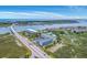Beautiful aerial view of condos by a waterway and bridge, highlighting the coastal landscape at 2393 Folly Rd # 1G, Folly Beach, SC 29439