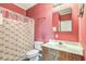 Bathroom featuring a shower and tub with a flamingo-themed shower curtain at 2393 Folly Rd # 1G, Folly Beach, SC 29439