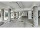 Well-lit parking garage with concrete columns and marked private storage at 2393 Folly Rd # 1G, Folly Beach, SC 29439