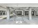Well-lit parking garage with concrete columns and elevator access at 2393 Folly Rd # 1G, Folly Beach, SC 29439