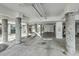 Well-lit parking garage with concrete columns and elevator access at 2393 Folly Rd # 1G, Folly Beach, SC 29439