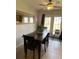 Cozy dining area with a wooden table, seating for four, and bright natural light at 243 Trickle Dr, Summerville, SC 29483