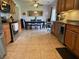 Spacious kitchen with wood cabinets, stainless steel appliances, and dining area at 243 Trickle Dr, Summerville, SC 29483
