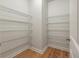 Spacious walk-in pantry with wire shelving to keep your kitchen organized and clutter-free at 2688 Jacana Ct, Mount Pleasant, SC 29466
