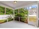 Relaxing screened porch shows a serene garden view and adds enjoyable outdoor living space at 2688 Jacana Ct, Mount Pleasant, SC 29466