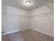 Empty walk-in closet featuring neutral carpet, shelving, and recessed lighting at 2688 Jacana Ct, Mount Pleasant, SC 29466
