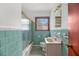 Bathroom featuring a vintage style tub and sink with charming tile at 2708 Mawood Ave, North Charleston, SC 29406