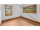 Bedroom featuring hardwood floors and natural light from multiple windows at 2708 Mawood Ave, North Charleston, SC 29406