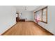 Bright living room featuring hardwood floors, large window, and natural light at 2708 Mawood Ave, North Charleston, SC 29406