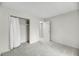 Empty bedroom with carpet, closet with curtain, and entrance to other rooms in view at 291 Sea Cloud Cir, Edisto Beach, SC 29438