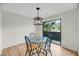 Dining area with pendant lighting and sliding glass doors opens to golf course view at 291 Sea Cloud Cir, Edisto Beach, SC 29438