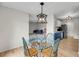 Open floor plan flows from dining area to modern kitchen and cozy living room at 291 Sea Cloud Cir, Edisto Beach, SC 29438