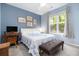 Bedroom with desk and chair, a bench, and a large window at 300 Bucksley Ln # 102, Charleston, SC 29492
