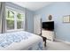 Bedroom featuring a large window and a TV on a dresser at 300 Bucksley Ln # 102, Charleston, SC 29492