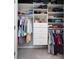 Organized walk-in closet with shelving, drawers, and hanging rods at 300 Bucksley Ln # 102, Charleston, SC 29492