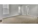 Bright bedroom with multiple windows and neutral carpeting at 3027 Robeson Trce, Johns Island, SC 29455