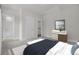 Bedroom featuring neutral walls, large bed, art, with access to a pristine bathroom, offering tranquility at 3027 Robeson Trce, Johns Island, SC 29455