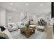 Bright open concept living room with kitchen, dining area, and comfortable seating at 3027 Robeson Trce, Johns Island, SC 29455