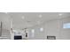 Open-concept living area with fireplace, kitchen island, recessed lighting, and neutral color palette at 3027 Robeson Trce, Johns Island, SC 29455
