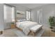 Stylishly furnished main bedroom featuring a comfortable bed and ample natural light at 3027 Robeson Trce, Johns Island, SC 29455