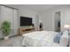 Inviting main bedroom with modern furnishings and a large television at 3027 Robeson Trce, Johns Island, SC 29455