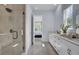 Contemporary bathroom featuring a tiled shower, double vanity, and neutral color palette at 3041 Robeson Trce, Johns Island, SC 29455
