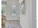 Elegant entryway with modern decor, leading into a bright and open home at 3041 Robeson Trce, Johns Island, SC 29455