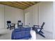 An outdoor patio space with stylish Adirondack chairs for relaxing and lounging on cool afternoons at 3041 Robeson Trce, Johns Island, SC 29455