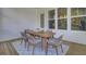 Covered outdoor patio provides an exterior dining table, and outdoor seating to enjoy the weather at 3041 Robeson Trce, Johns Island, SC 29455
